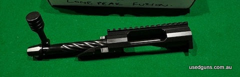 New, never had a barrel threaded on. Lone peak Fuzion, 20 MOA short action right hand magnum bolt face, aw cut and fully dlc coated.
