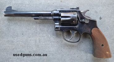 Smith and Wesson Victory model converted to .22 in the late 1940s to early 50s, adjustable rear sight. $300 plus post