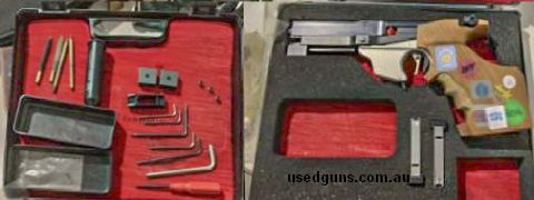 Original hard case, tools, rail, weights, dry fire plug, loading tool, original cleaning kit, two mags and some extra Allen screws for the weights and one for t