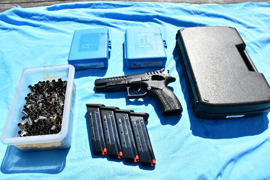 Roxor Grand Power .380 ACP. The gun comes with case, four magazines, a set of Dillon dies, a Dillon 650 conversion kit and approx 400 empty cases. It is an extr
