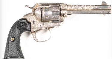 Excellent condition, 121mm barrel, extensively engraved.¬†
