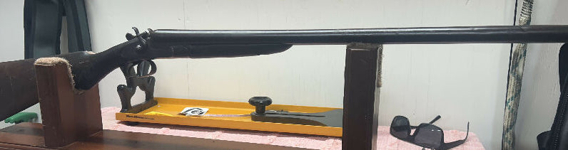 Old side by side, hammered shot gun , 100 plus years old . Rough condition, it will need a full restoration