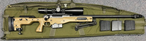 Hard to find Accuracy International AWM in 338 Lapua. Would be excellent except for some small marks on the barrel. Fully set up with Schmidt & Bender PMII 5-25