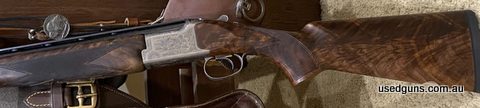 Excellent condition 12G Grade 5 Sporter Amazing timber work Beautiful looking gun, not a mark on it, kept as new Comes with case Please ask for more photos