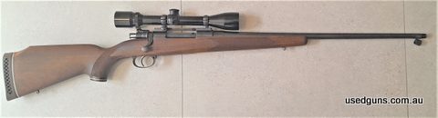 A quality British Rifle made by Churchill of London based on a controlled round feed Mauser 98 action with a wing safety for scope clearance. Bore and timber ve