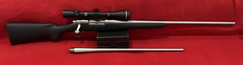 REM 700 titanium rifle in 25-06, comes with original 30-06 barrel, 25-06 barrel has fired 206 rounds and the original 30-06 barrel has fired under 100 rounds, c