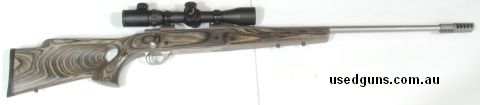 HOWA 1500 Stainless in 338 WIN MAG. It comes with a brake on a 24 inch barrel. It has a Boyd grey laminated thumbhole stock. It comes with an ARTIC FOX SF 3 - 1