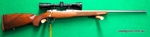 In excellent condition, has only ever fired a packet since purchased new. Comes with Zeiss Terra 3-9x42 scope & mounts pictured. Happy to send pics as needed. P