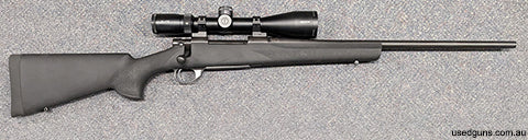 A new Howa 1500 Blued in 30-06. This rifle has the 22" sporter profile barrel and is in a Hogue black stock. Comes with a Bushnell ELITE 4500 4-16x50 scope and 