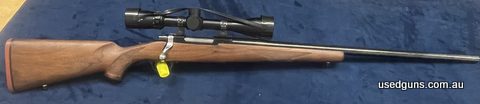 6mm Remington. Swan match barrel. 24 inch. Half inch accuracy. Comes with Redding dies and 100 new cases.
