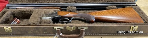 Browning B25-A grade comes with 4 Briley thin wall chokes snap caps and Browning hard case and recent work done , 1firing pin replaced and replacement off broke