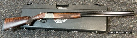 Excellent condition Miroku Mk 10 Grade 5 Sporter. Has 30 inch barrels. Has intricate floral engraving on the action. Comes cased with 4 chokes. $65 freight to y