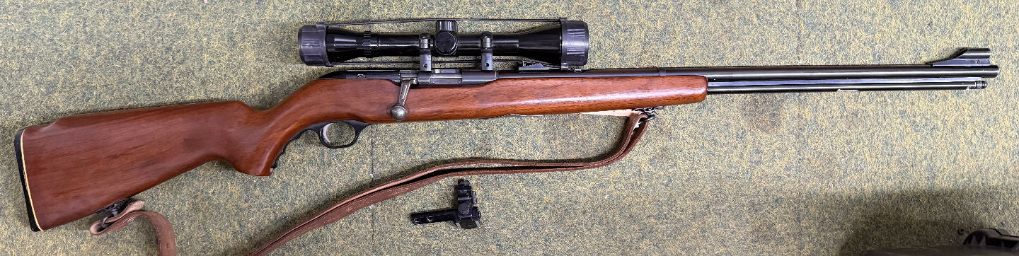 This quality Mossberg 346BA bolt action .22 cal rifle was manufactured in the early sixties is equipped with the original fifteen round tubular magazine and is 