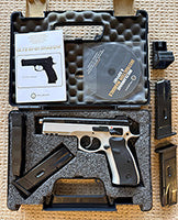 As new - Hardly used - 4 Magazines and Speed Loader - case and all Books and Instructions