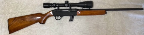 The Gevarm E1 is a .22 LR caliber, open-bolt, semi-automatic rifle known for its unique design and takedown capability. It was manufactured in France, primarily