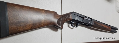 Dickinson T1000 12Ga straight pull shotgun. Only used once, wood is like new. Comes with chokes and has 6 shot mag tube.