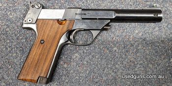 A High Standard Supermatic Citation Model 107 Military pistol in 22LR in very good condition for its age. This pistol has no major marks on the wood or metalwor