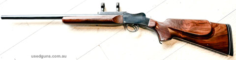Single shot 300 Whisper custom build on a martini action. Very nice Monte Carlo style stock, deep blueing and 500 mm varmint barrel. Great little walk about rif