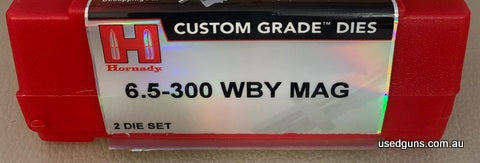 As new Hornady Custom Grade 6.5-300 Weatherby Magnum FL resizing and seating die set in box. Buyer to pay postage.