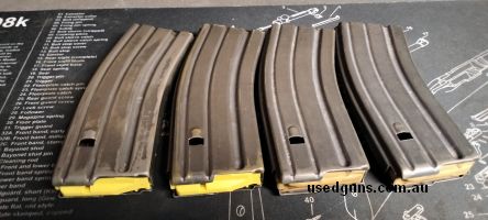 4X AR 30 round Steel mags. The two on the right are GI Colt mags. The other two are aftermarket American made Copies. They have long throw followers on them. Th