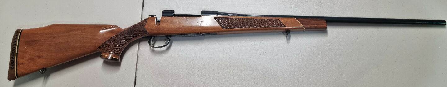Early Sako L579 Deluxe .243 ‚Äì Rare single-deer engraved floorplate, bofors steel barrel, microgroove rifling.