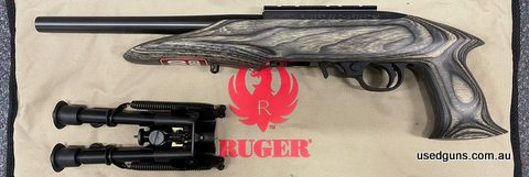 Ruger Charger 22LR Laminated 10 inch barrel cased with original box, rail and bipod. In new condition with one small mark on right hand side of the stock