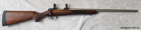 Kimber 84M Varmint .223 in Very Good condition with a beautifully wooden stock. Stailess steel fluted barrel. Famous mauser controlled round feed. With only min