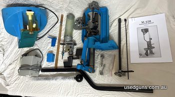 Dillon 650 and case feeder set up. Was used for small pistol (plate included) No caliber conversion kit or dies. Power transformer included. Pick up Brisbane No