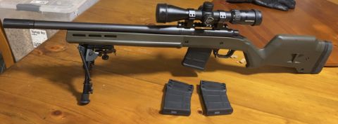 Original Remington 700 action in a magpul hunter chassis with a 6 month old nightforce SHV 3-10x42 with 3 x 10 round mags