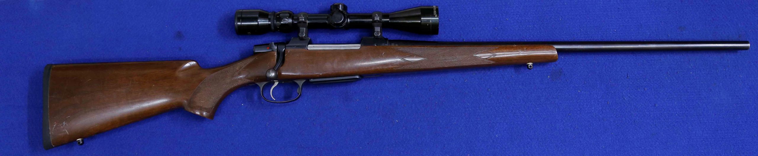 Detachable magazine, sporter barrel, timber stock.