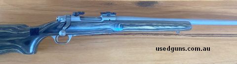 Price negotiable - Postage included Heavy tapered 26 inch stainless barrel Laminated beavertail forend stock Bases included Excellent spot lighting gun which is