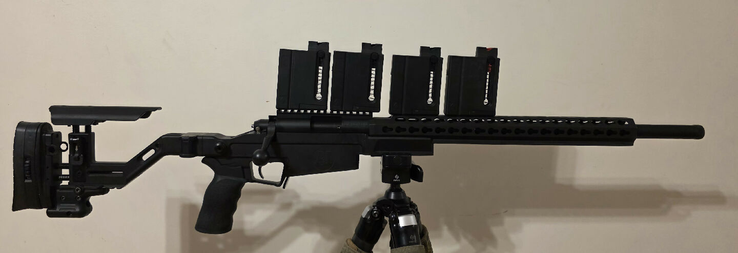 Vudoo Three 60 in folding or fixed (Buyer's choice) accuracy international AXSR chassis. 40 MOA rail, round bolt knob. Includes 4 magazines. CG Jackson XTSP 2 s