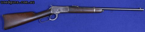 Winchester 1892 , lever action, blue barrel, timber stock is used & battered but not split or cracked, still in safe working order.