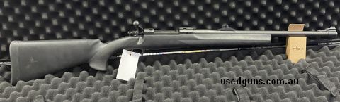 Ruger M77 Hawkeye chambered in the perfect big game cal 375 Ruger. Rugged synthetic stock with a minor marks. Open sights.