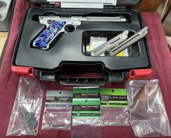 Perfect condition Ruger Mark IV semi-auto. Fired around two bricks of ammunition only. Has new grips, trigger job done, ambi safety, extended bolt release, come