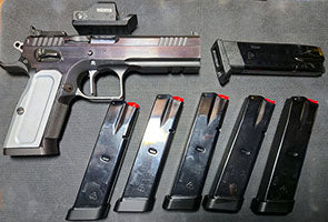 Stock III with a bit or work done. Extra springs and parts, 6 magazines, Boss Components scope mount. Shoots amazing.