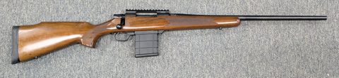 A Howa 1500 Sporter with a walnut stock in 6.5 Creedmoor in very good condition. The metal work is very good but the stock has a few marks and blemishes from be