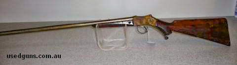 Hollis & Son Rook Rifle 430 cal on top of octagonal barrel. Martini action that works well. Stock needs re-doing. All in all a good project Antique Estate Sale.