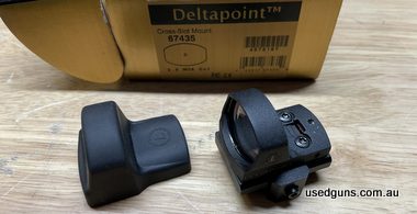 Deltapoint red dot with Picatinny rail base, cover and packaging. Went to an Aimpoint so surplus to requirements. Price plus post