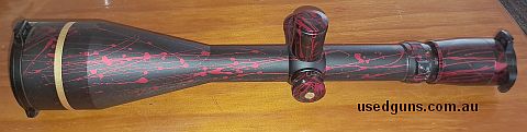 scope is curved for low mounting to barrel. it comes with genuine aluminium leupold flip up covers. has varmint hunter reticle. and it's a limited edition red s