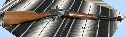Marlin Model 336 in 30-30 Winchester. Serial number dates production to 1979. Rare straight stocked ‚Äö√Ñ√≤Texan‚Äö√Ñ√¥ model with an 18.5‚Äö√Ñ√π barrel. Trigge