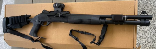 Sulun Arms Tac12 shotgun complete with pic rails top and side for scope and weapon light mounting, QD swivel attachment and stretch sling. Rear ammo sock. Origi