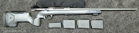 S20 precision, heavy barrel, factory cerakote finish. 300 rounds fired Rifle is as new with the exception of a mark from a buckle beside the front sling QD poin