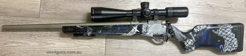 left handed, titanium cerakote, polymer stock that‚Äö√Ñ√¥s been hydro dip painted and slightly relieved to free float the barrel. Has a pic rail under the foren