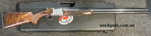 As new Miroku MK70 Grade 5 Sport. 32" with Adjustable Cheek Piece. Has seen very little, if any use. Comes cased with 7 adjustable chokes. $65 freight to your d