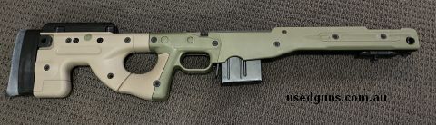 Rem700 AICS AT stock, short action, with AI magazine. Original grips included, thumb hole kit added.