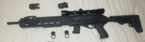 Lever release style action, 10 shot mag, fast shooting. Basically a new gun no marks, bought locally last year haven't been using it. Side mounted light and sig