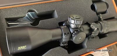 Bushnell Elite Tactical XRS2 4.5-30x50 with the awesome H59 first focal plane reticle. Superb ED Prime Glass makes hits at 1000m easy and the 10mil turrets are 