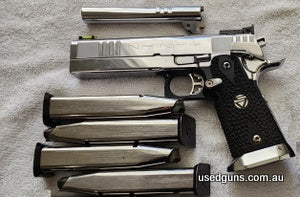 Beautiful Infinity in 357 Sig with Infinity removable breech face and additional 38 Super bull barrel and Infinity 38 Super breech face. No expense spared in cr