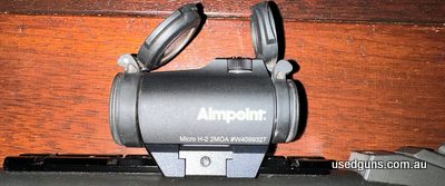 Aimpoint Micro H-2 2 MOA - Red dot reflex sight in very good condition. This sight comes with mount, minimal use, priced to sell. Works perfectly fine, more pho